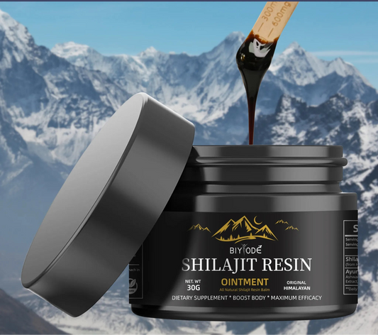 Bottle of Shilajit resin with a mountainous background